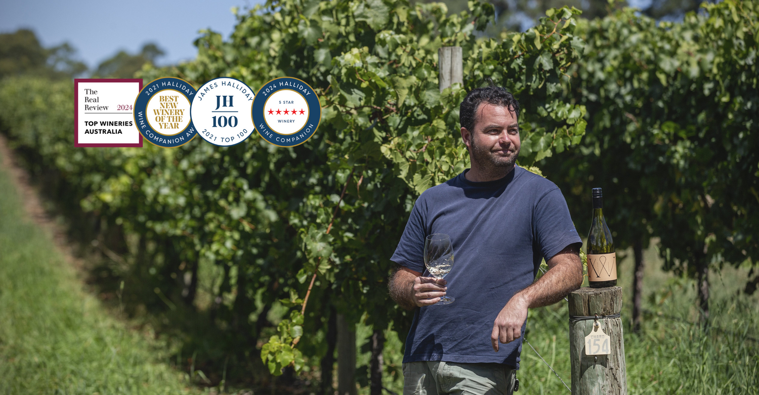 Varney Wines winemaker, Alan Varney standing in the vineyards with a glass of his Chardonnay. Images includes a series of accolades and awards.