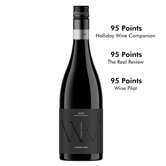 Bottle shot of Varney Wines 2022 Syrah with a bunch of 95 points badges and accolades.